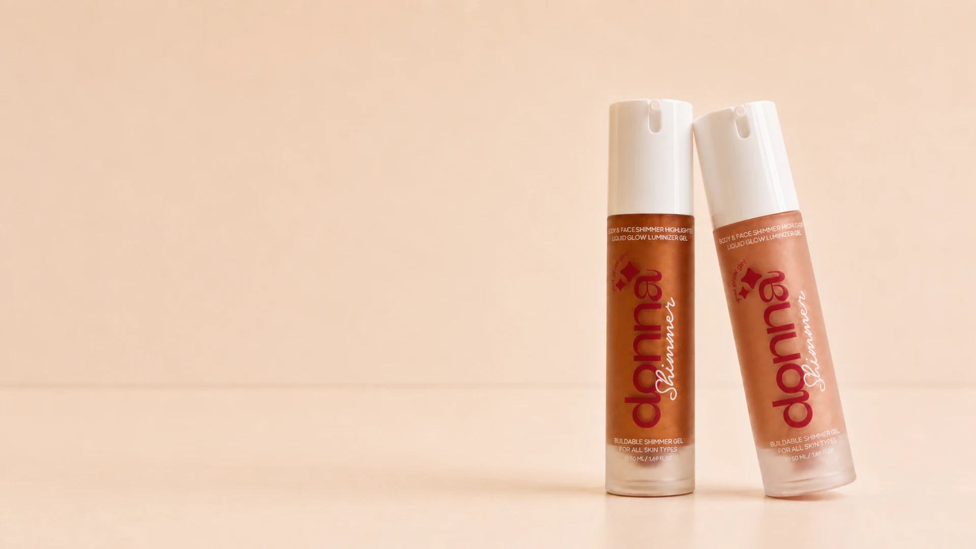 Donna Bronze Glow and Sunkissed Body Shimmer bottles in warm studio light